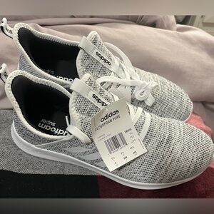 Adidas Cloud Foam running shoes.